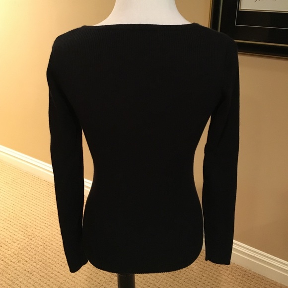 black body hugging top